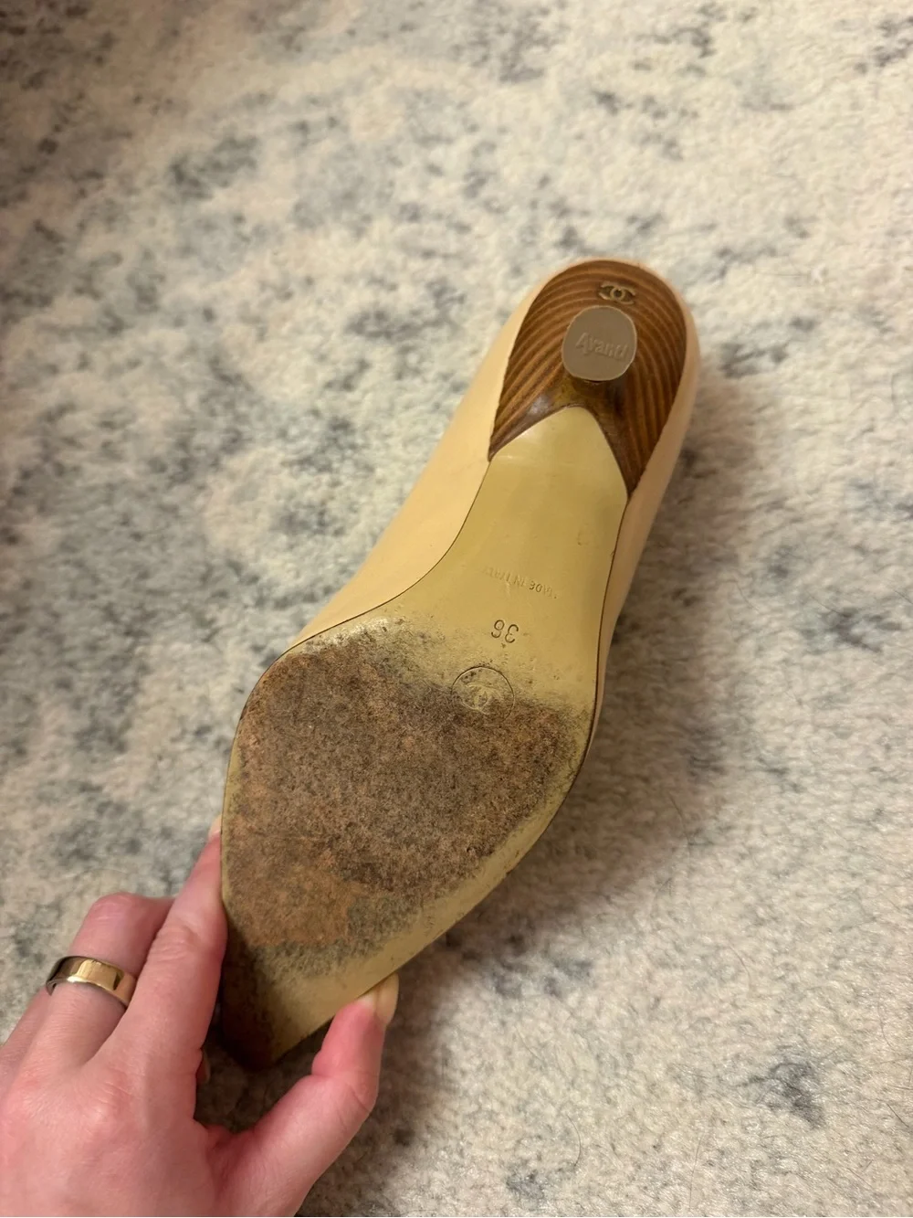CHANEL Beige Pointed-Toe Leather Pumps with Bow and CC Charm